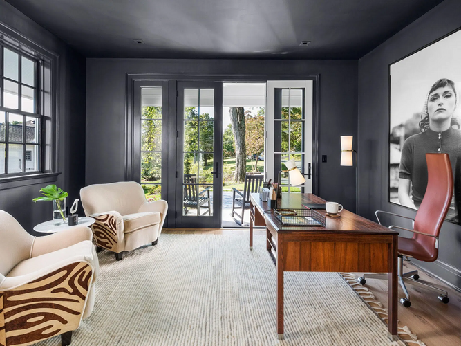 A well planned luxury home office showing a premium investment chair paired with simple and functional custom shelving.