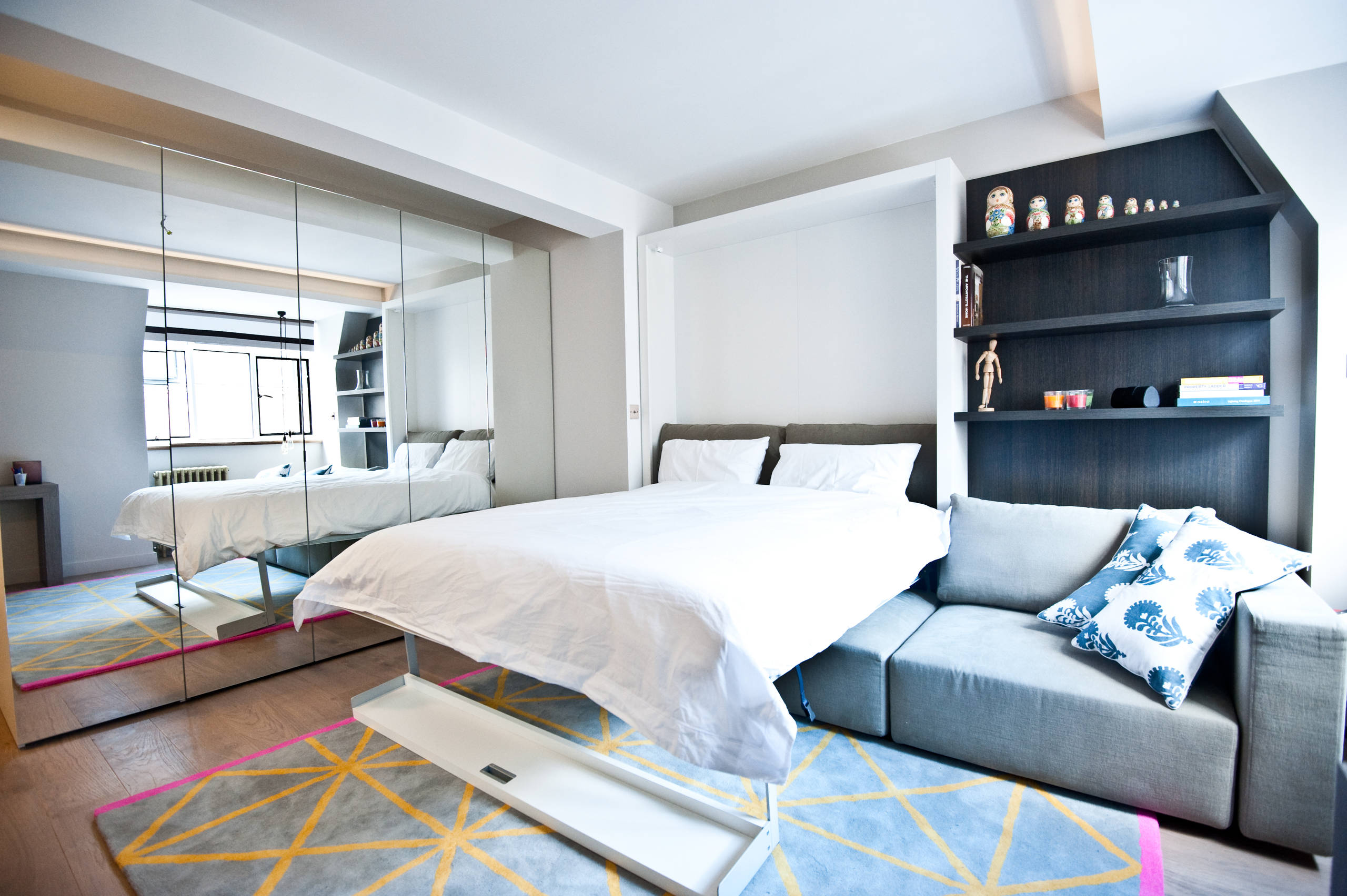 transforming furniture in a studio apartment bedroom