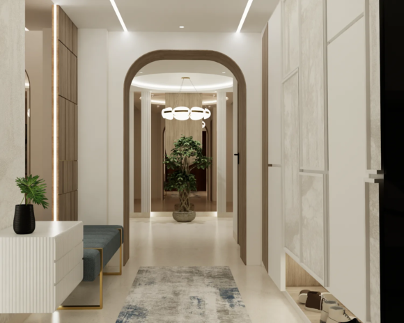 Entrance with arched doorway warm wood panels and cove lighting The Opaline Penthouse Al Majaz Sharjah