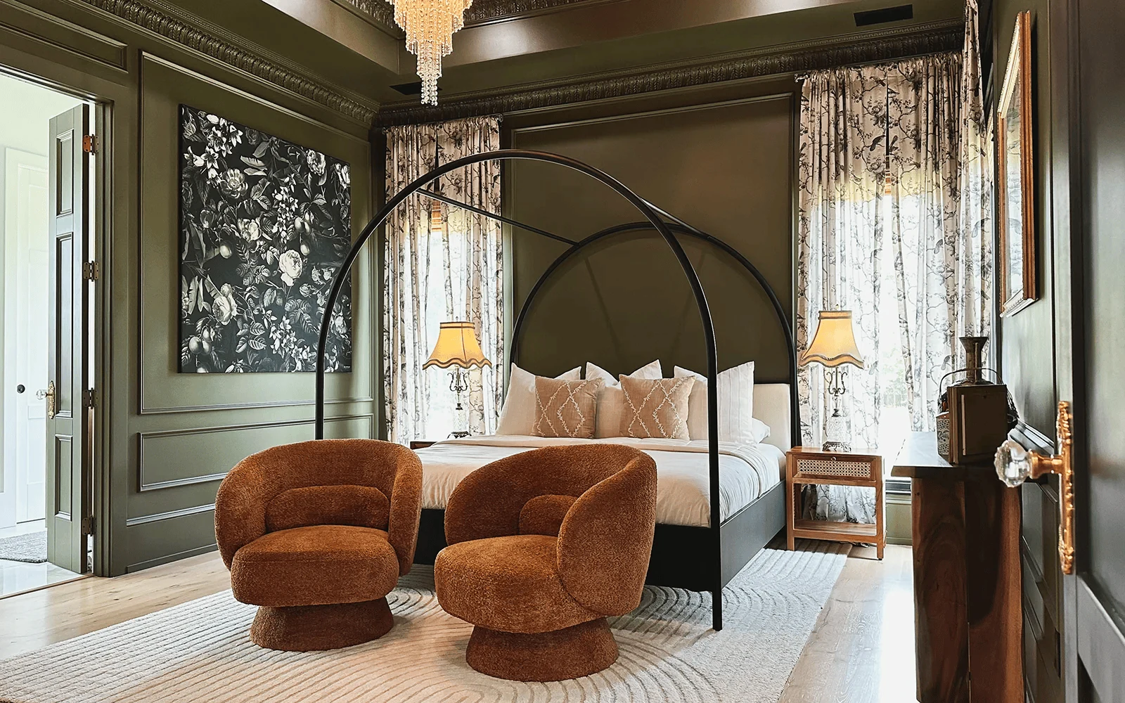 dark bedroom decor with unlacquered brass objects reflecting accent light