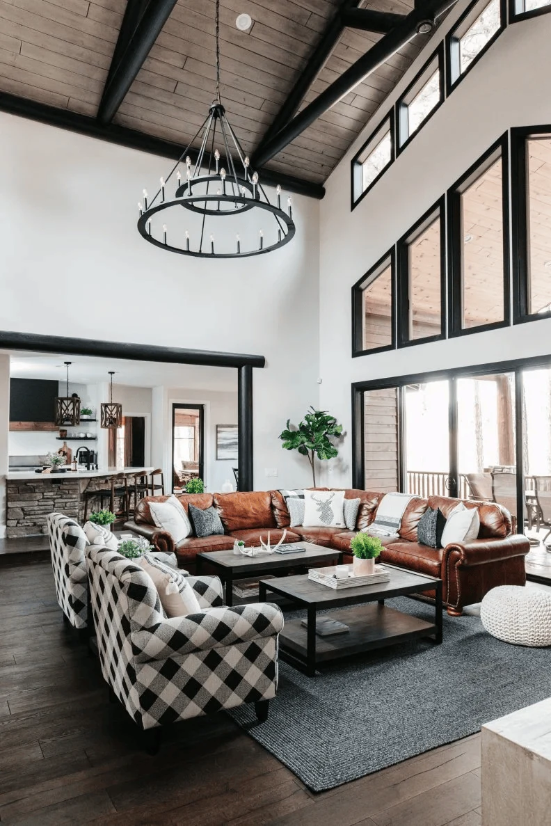 add black metal accents for modern contrast cabin interior design