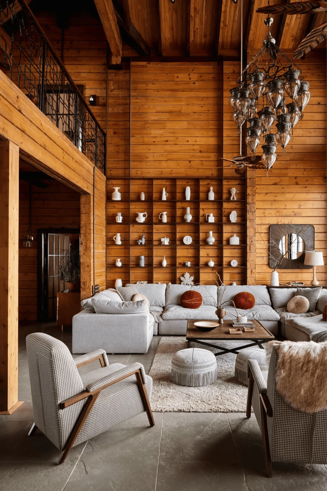 use rugs to warm wood or stone floors cabin interior design