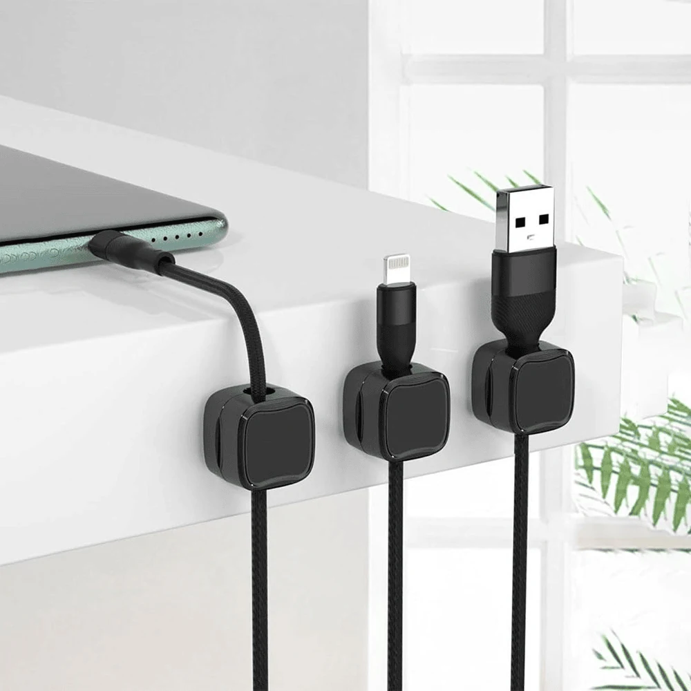 dorm room hacks using magnetic cable clips to tidy the study desk