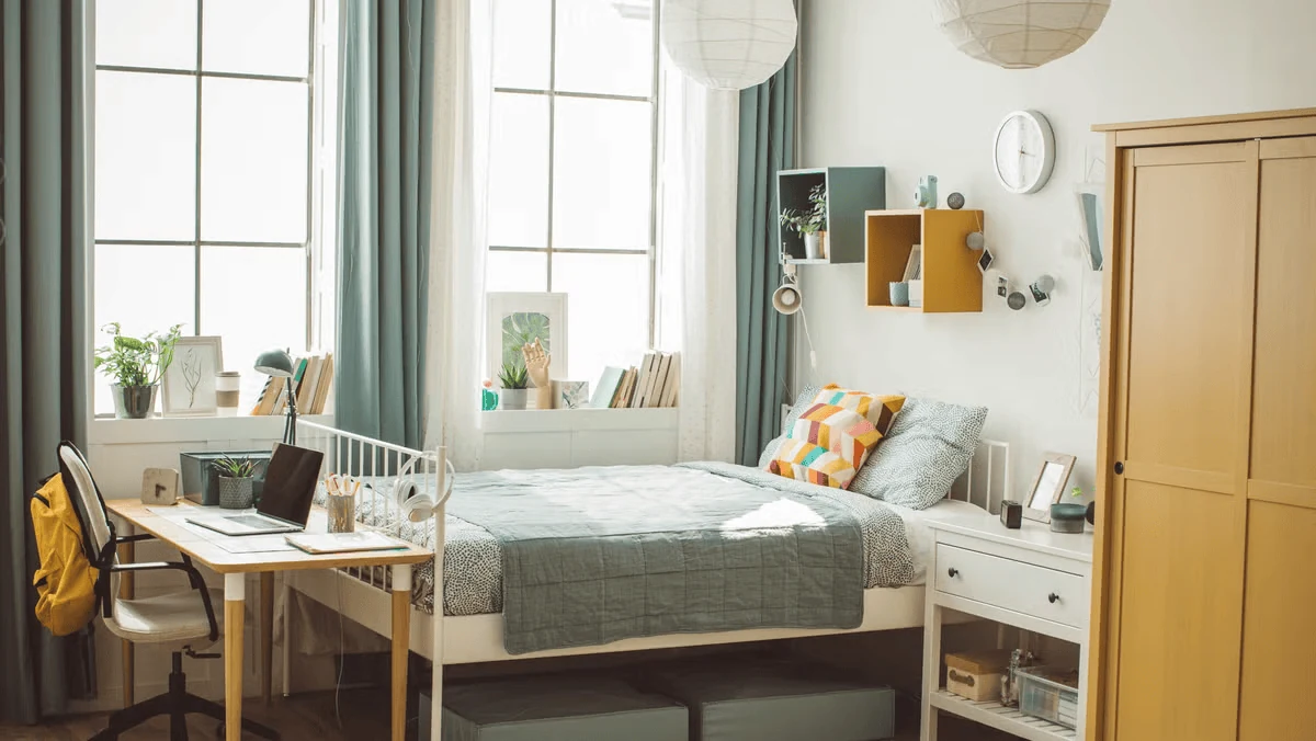 dorm room storage using closed fabric bins for visual calm