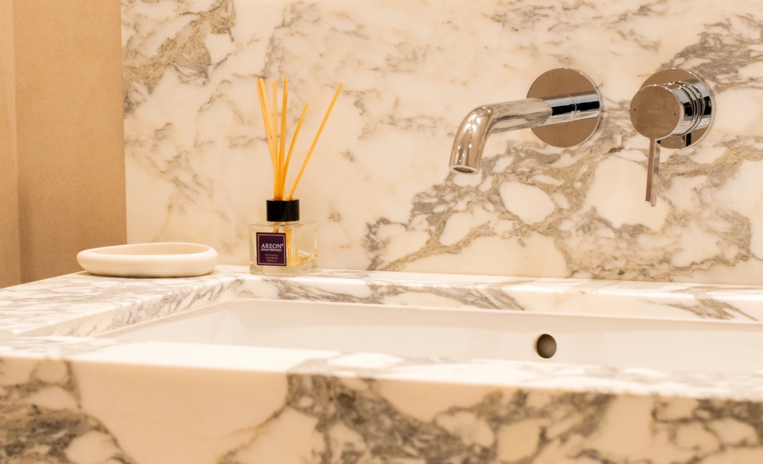 Eden House bathroom lighting in the 1BHK apartment design
