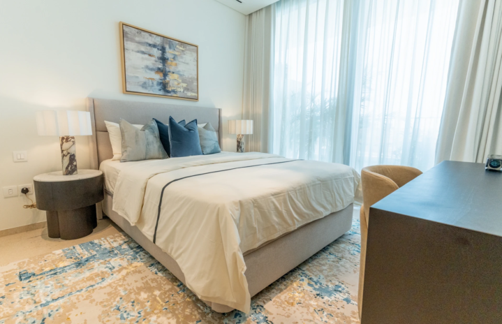 Eden House bedroom with built in storage in a 1BHK apartment design