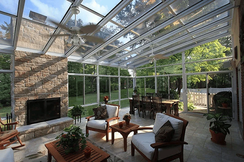 four season sunroom ideas with a glass roof and motorised shades