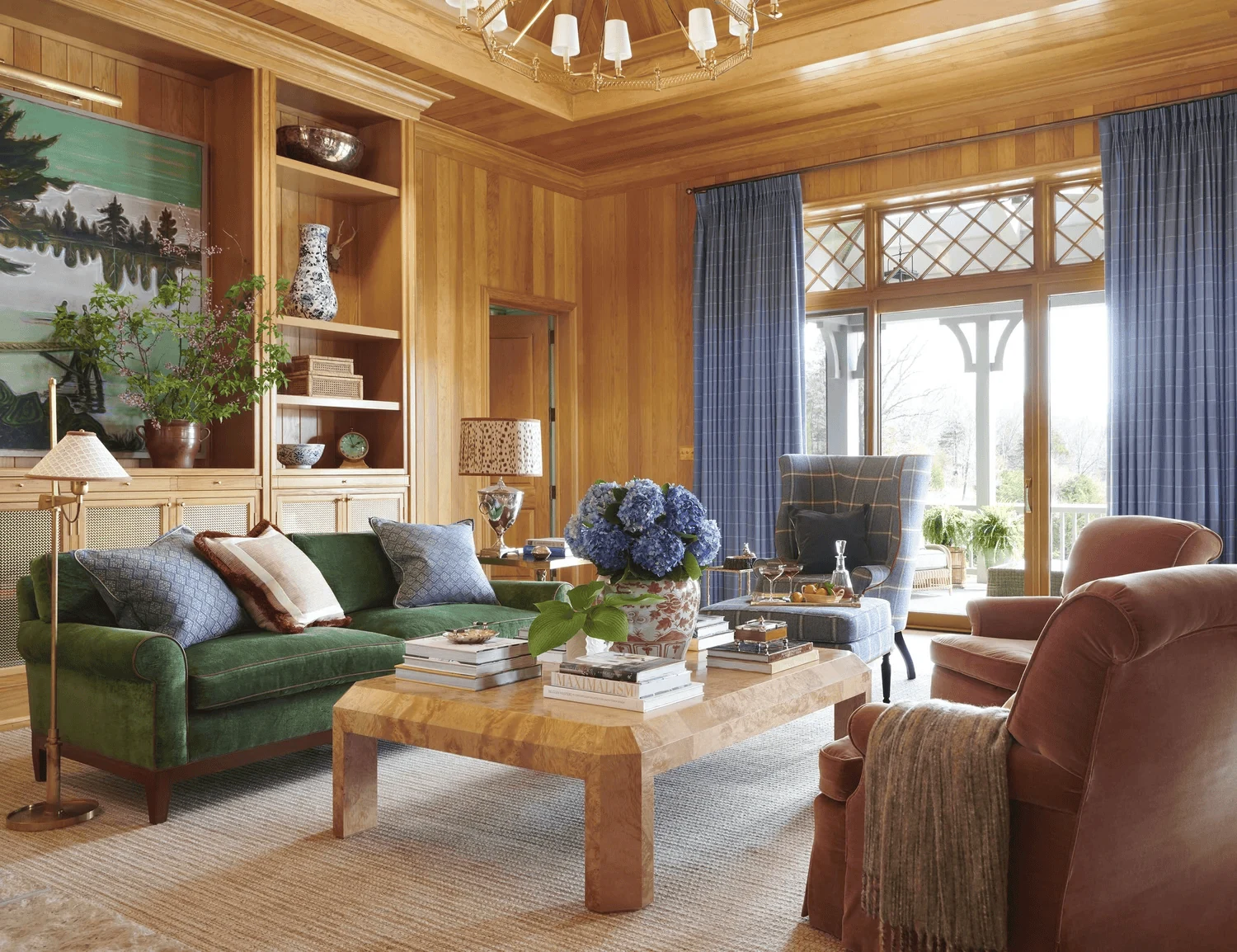 grandmillennial interior design living room with vintage patterns ceramics and floor lamps