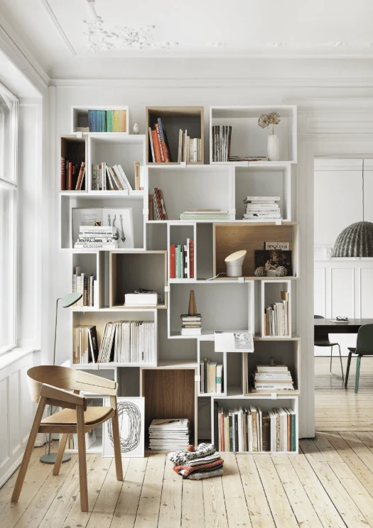 minimal white shelving libraries home library