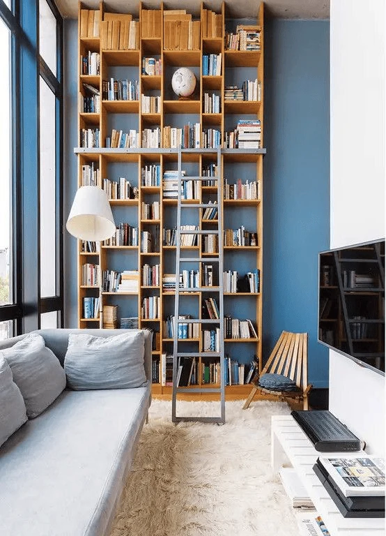 library rooms with rolling ladders