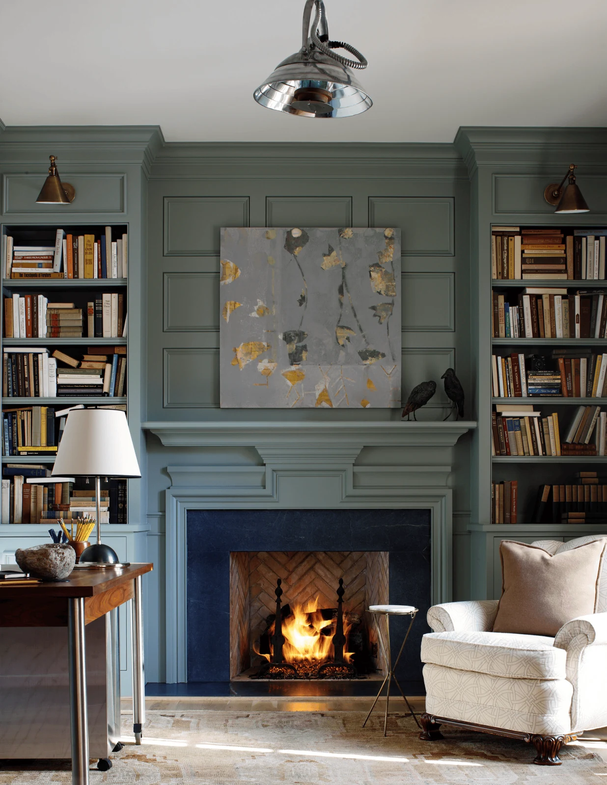home library with a fireplace