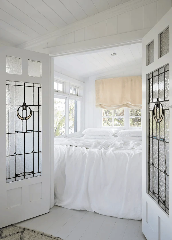make the bed feel relaxed with linen layers light academia decor