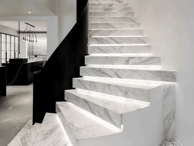 marble and metal staircase railing for a high end finish