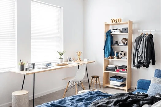 minimalist dorm room ideas with a clear study desk
