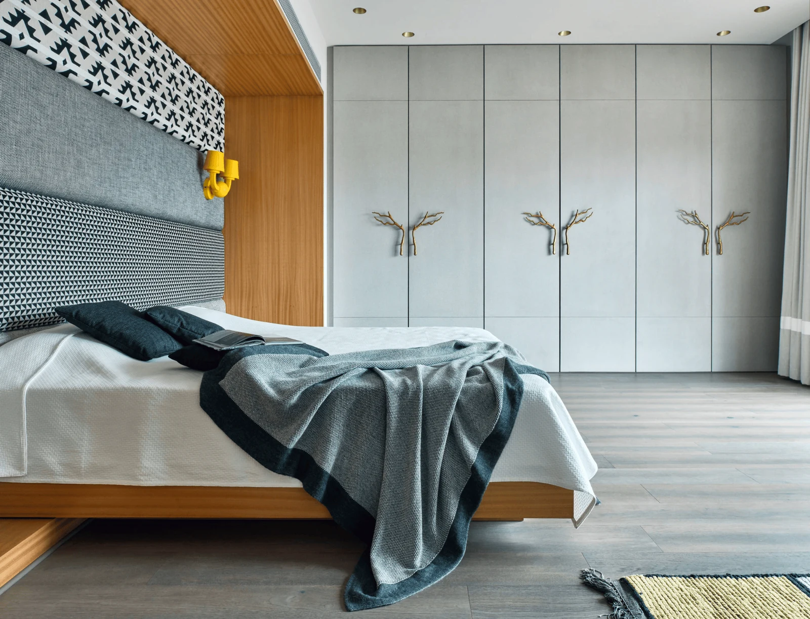 make a large wardrobe blend into the wall