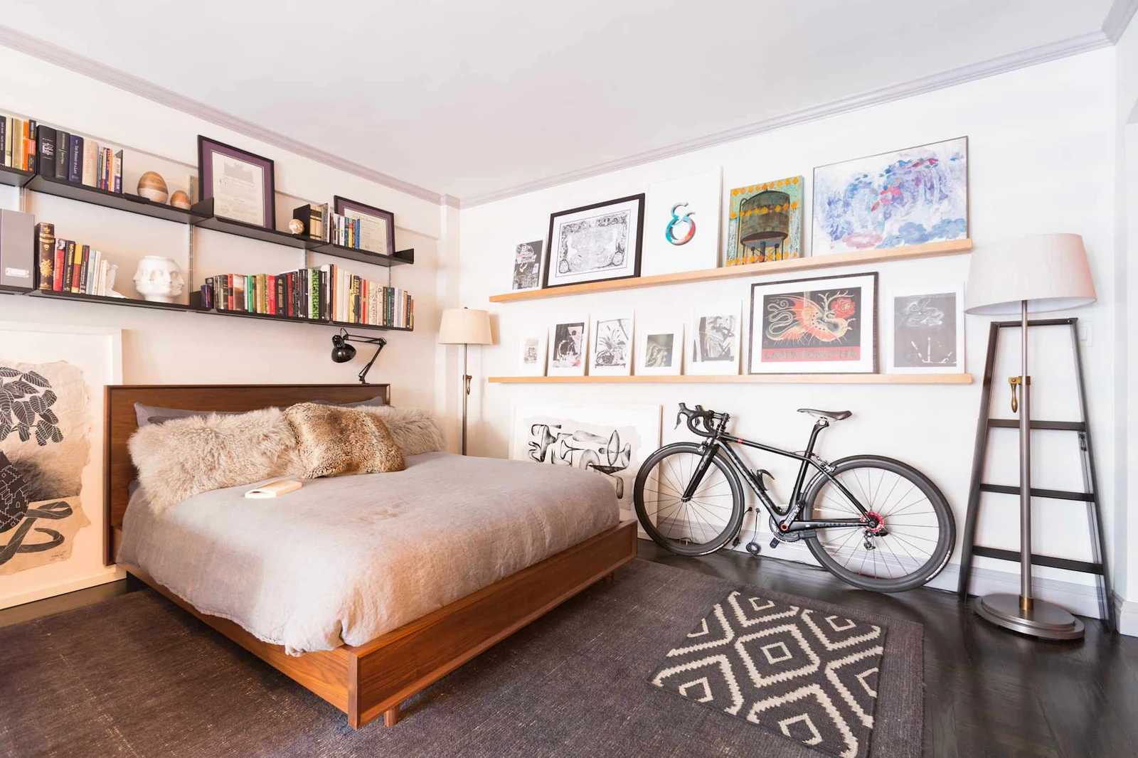 dorm room shelves above the bed for books and light decor