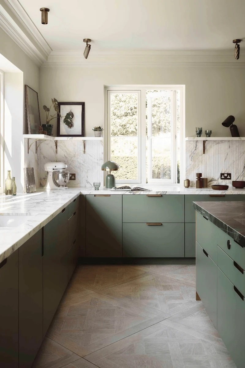break sage shaker cabinets with a plain plaster range wall
