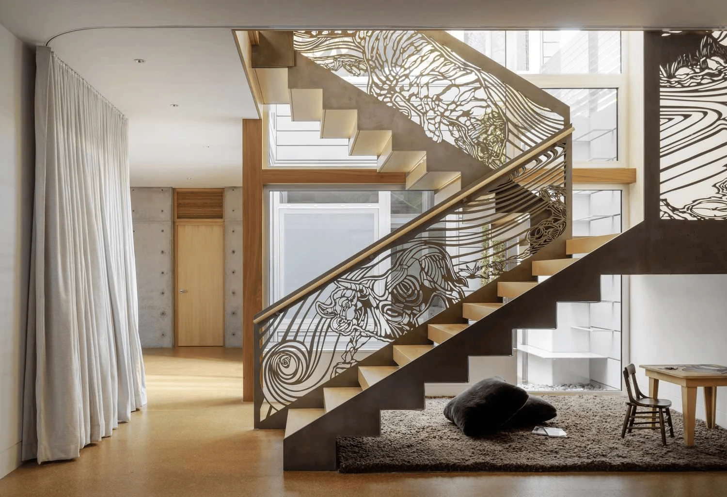 sculptural custom stair railing as a statement staircase feature