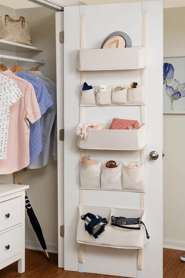 dorm room storage with a slim wall rack for bags caps and scarves