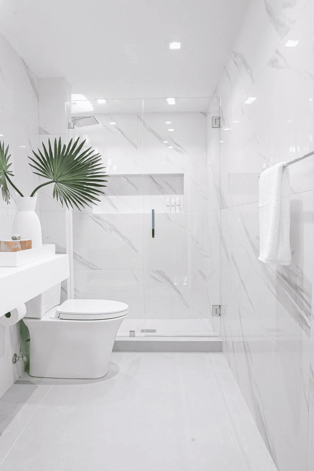 small-bathroom-large-format-tiles-fewer-grout-lines