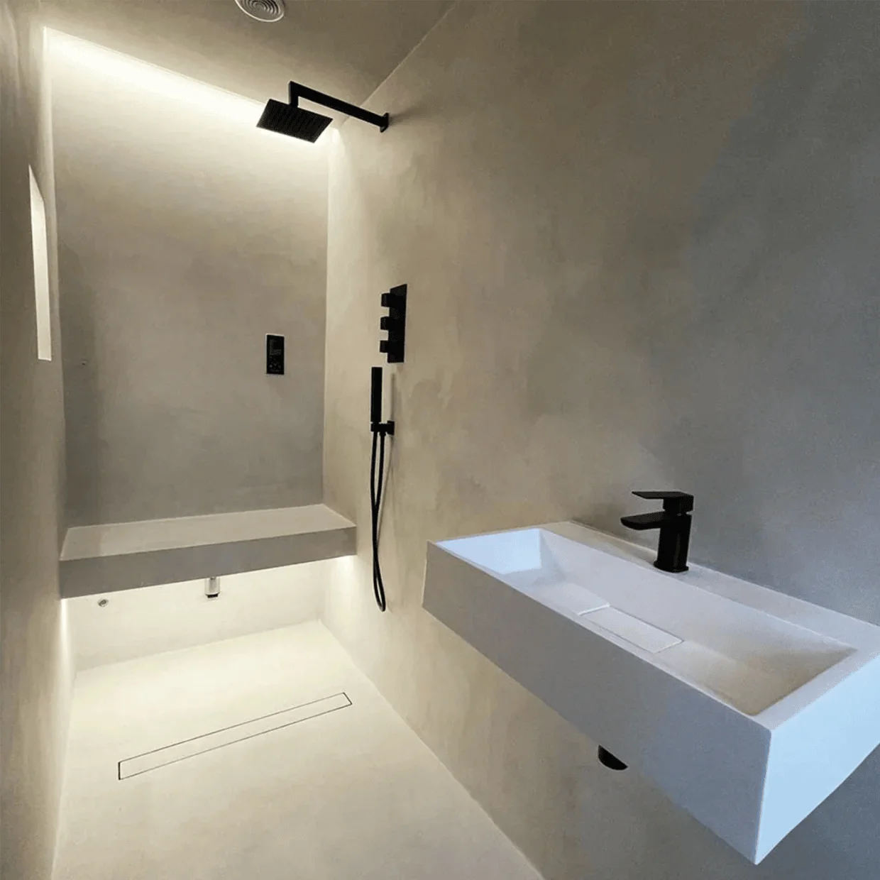 small-bathroom-linear-shower-drain-seamless-floor