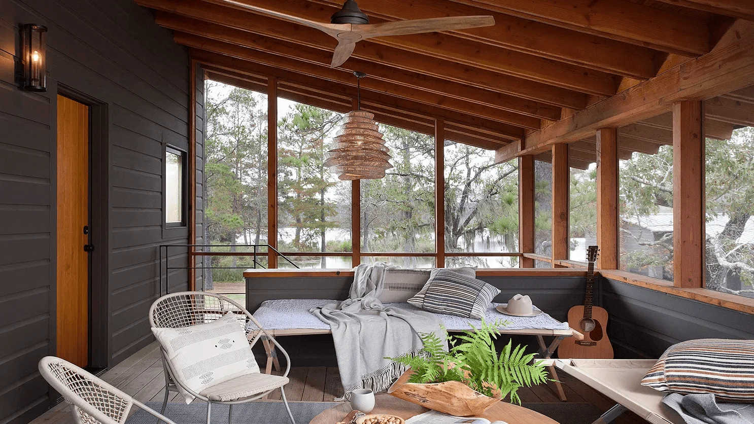 sunroom ideas with timber ceiling beams and floor to ceiling glass