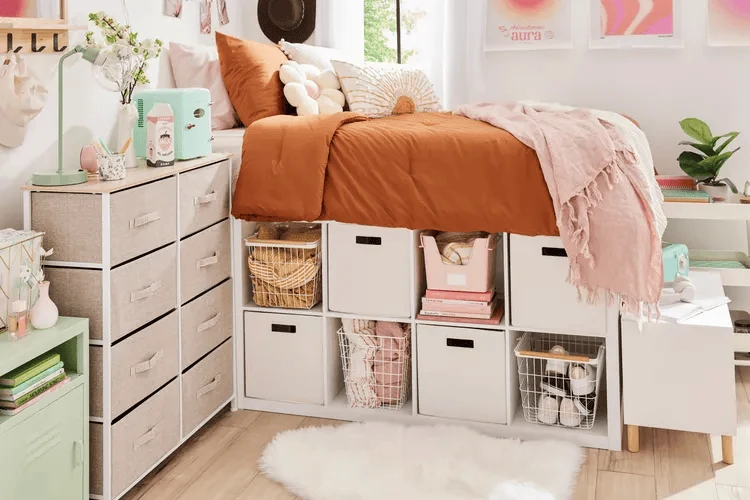 dorm room storage using clear boxes under the bed for clothes and bedding