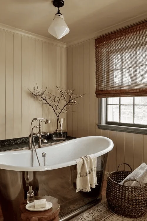 Use a Metallic Tub and Warm Accents