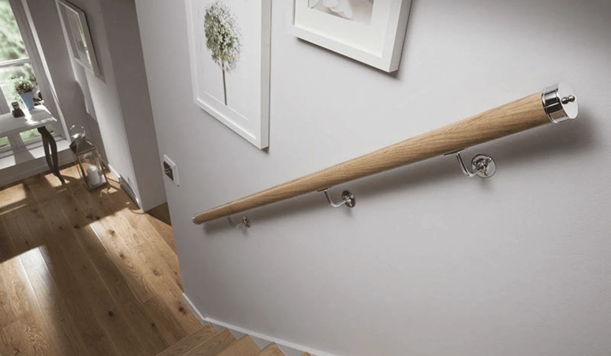 wall mounted stair handrail design for a narrow staircase