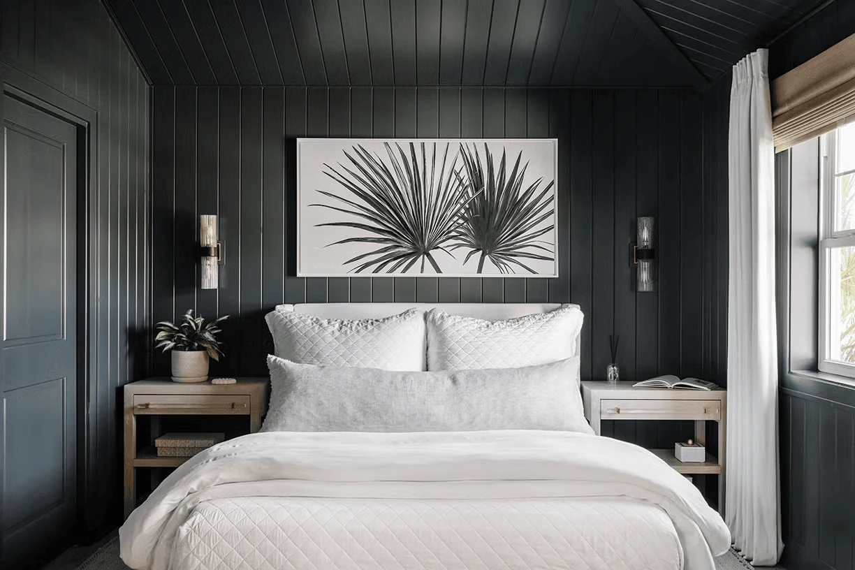 dark bedroom decor with white mounted prints creating sharp visual separation
