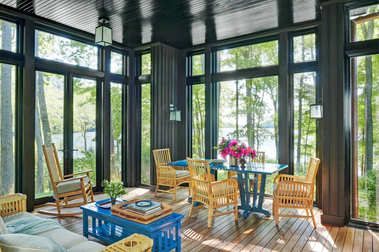 bright living room ideas with black aluminium glazing and a waterfront view