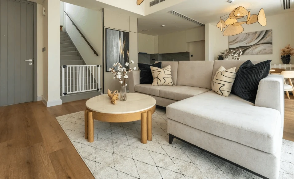 living room with a sofa and a coffee table in a 2bhk apartment