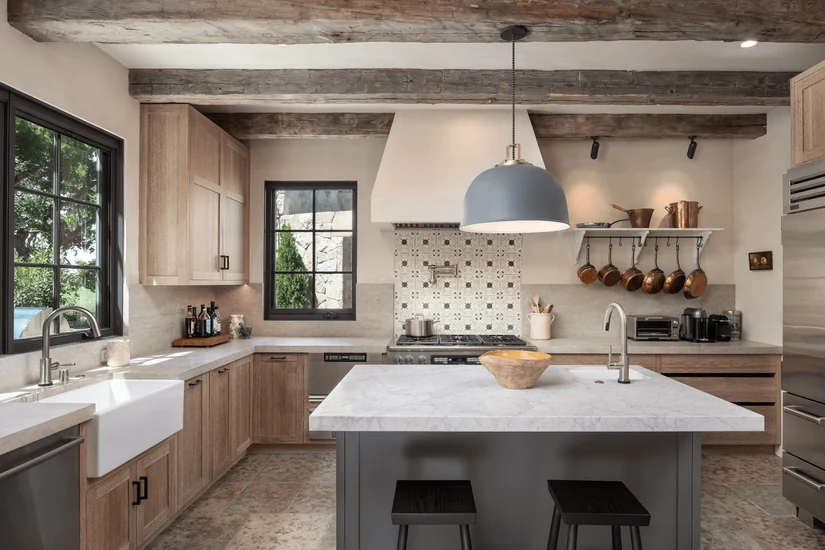 warm wood shelves and matte countertops in the kitchen mediterranean interior style